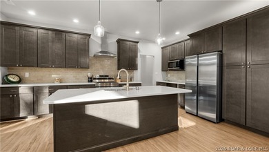 Step into effortless living with this immaculate, newer - photo 7
