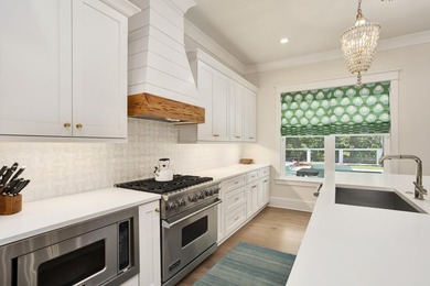 This well appointed custom built home is located in the highly - photo 17