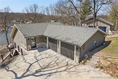 Discover this immaculate 2nd-tier ranch in Linn Creek, boasting - photo 1