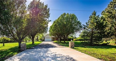 Beautiful ranch home on 2.5 acres with lake access. Located in - Lake Home For Sale in Lane, Kansas