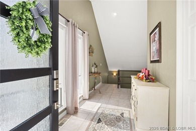 Discover this immaculate 2nd-tier ranch in Linn Creek, boasting - photo 4