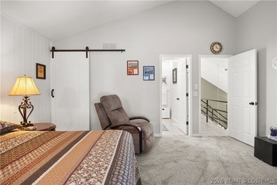 Discover this immaculate 2nd-tier ranch in Linn Creek, boasting - photo 8