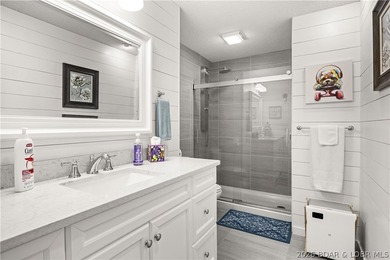Discover this immaculate 2nd-tier ranch in Linn Creek, boasting - photo 10