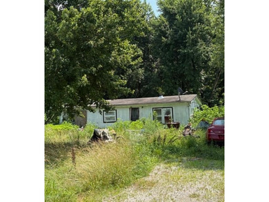 3.85 acres of developed land being sold for land value only! - photo 1