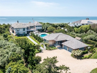 Set along the coveted shores of Dune Road in Quogue, this - photo 1