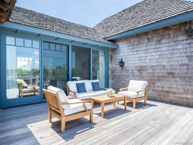 Set along the coveted shores of Dune Road in Quogue, this - photo 3