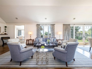 Set along the coveted shores of Dune Road in Quogue, this - photo 4