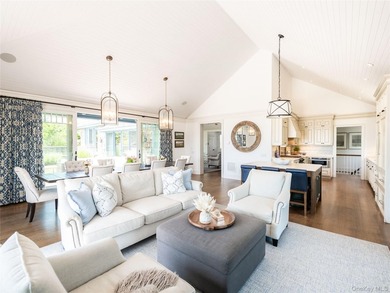 Set along the coveted shores of Dune Road in Quogue, this - photo 9