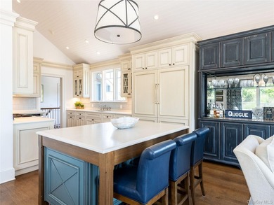 Set along the coveted shores of Dune Road in Quogue, this - photo 10