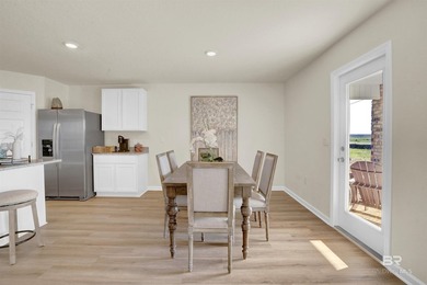 The Cali is an attractive one-story home with a spacious two-car - photo 18