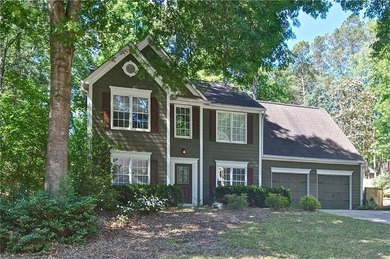 Make this charming Wyngate/Towne Lake home your own! Wonderful - photo 1