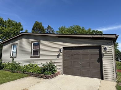 Charming 3-bedroom, 2-bathroom home located in the welcoming - photo 1