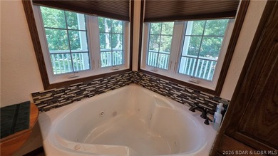 Lakefront Oasis! Discover this exceptional 5,200+ sq ft custom - photo 13