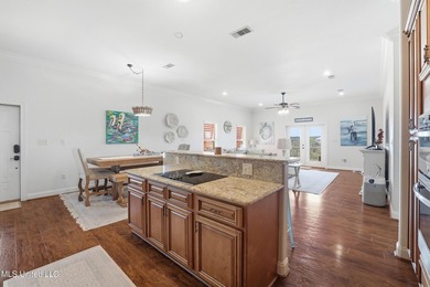 This beautifully maintained elevated waterfront home located in