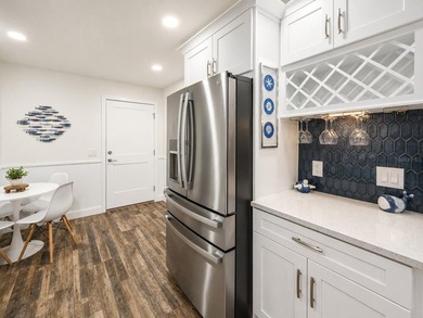 Step into a space that rivals a model home.  Fully renovated - photo 12
