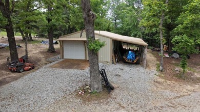 Tucked away in the beautiful Ozarks near Bull Shoals Lake, this - photo 14