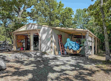 Tucked away in the beautiful Ozarks near Bull Shoals Lake, this - photo 15