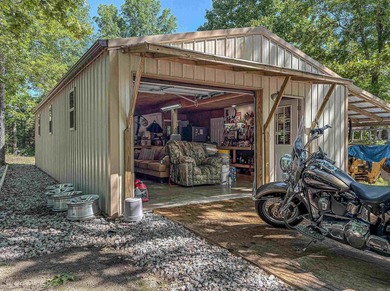Tucked away in the beautiful Ozarks near Bull Shoals Lake, this - photo 16