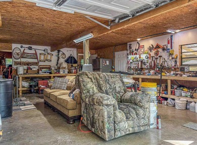 Tucked away in the beautiful Ozarks near Bull Shoals Lake, this - photo 17