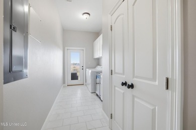 This beautifully maintained elevated waterfront home located in