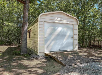 Tucked away in the beautiful Ozarks near Bull Shoals Lake, this - photo 19