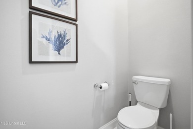 This beautifully maintained elevated waterfront home located in