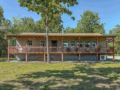 Tucked away in the beautiful Ozarks near Bull Shoals Lake, this - photo 21