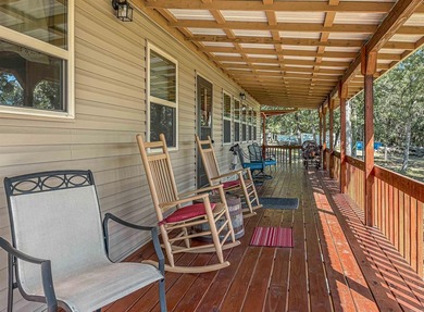 Tucked away in the beautiful Ozarks near Bull Shoals Lake, this - photo 23