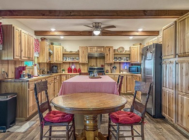 Tucked away in the beautiful Ozarks near Bull Shoals Lake, this - photo 27