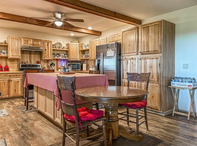 Tucked away in the beautiful Ozarks near Bull Shoals Lake, this - photo 29