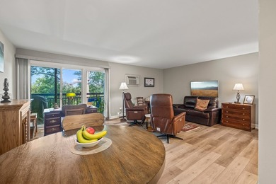 Welcome home to this spacious second-floor condominium tucked - photo 7