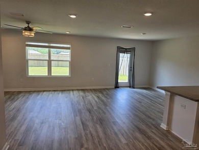 The Freeport is a cozy 4 bed, 2 bath open floorplan home located - photo 2