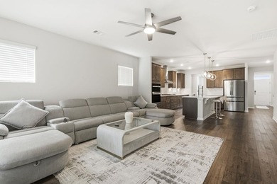 This popular Beazer Hickory model, built in April 2025, offers a - photo 14