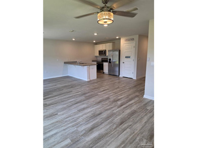 The Freeport is a cozy 4 bed, 2 bath open floorplan home located - photo 4