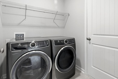 This popular Beazer Hickory model, built in April 2025, offers a - photo 30