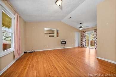 Escape to this charming and affordable lake retreat, just - photo 4