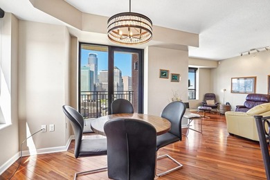 Elevated above the city on the 19th floor, this stunning corner - photo 7