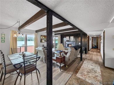 Looking for the perfect lake retreat? This Osage Heritage condo - photo 4