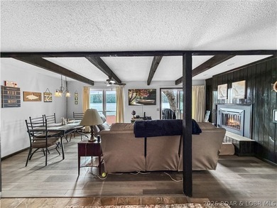 Looking for the perfect lake retreat? This Osage Heritage condo - photo 5