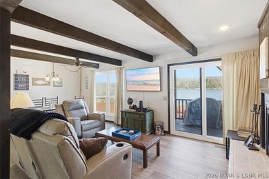 Looking for the perfect lake retreat? This Osage Heritage condo - photo 9