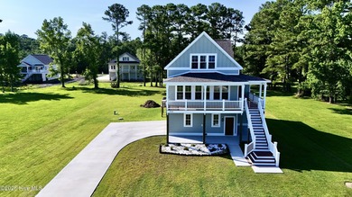 Discover elevated coastal living in Whittaker Point, one of - photo 1