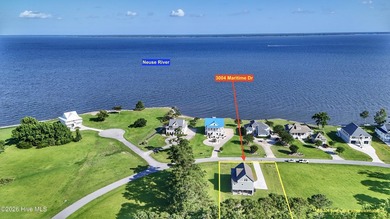 Discover elevated coastal living in Whittaker Point, one of - photo 2