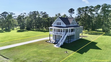 Discover elevated coastal living in Whittaker Point, one of - photo 5