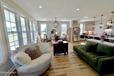 Discover elevated coastal living in Whittaker Point, one of - photo 7