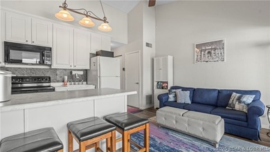 Experience the ultimate lake lifestyle at Heron Bay, a premier - photo 4