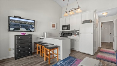Experience the ultimate lake lifestyle at Heron Bay, a premier - photo 5