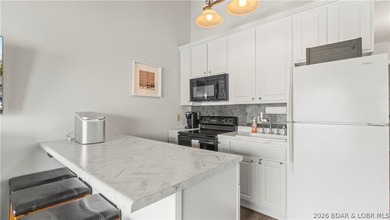 Experience the ultimate lake lifestyle at Heron Bay, a premier - photo 6