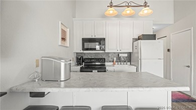 Experience the ultimate lake lifestyle at Heron Bay, a premier - photo 7