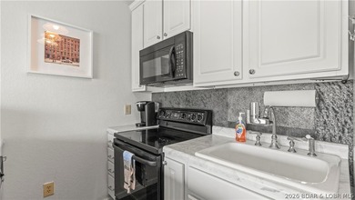 Experience the ultimate lake lifestyle at Heron Bay, a premier - photo 9