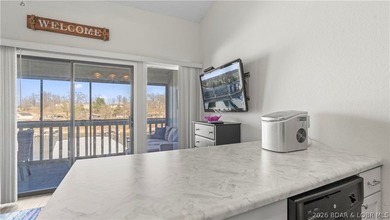 Experience the ultimate lake lifestyle at Heron Bay, a premier - photo 10